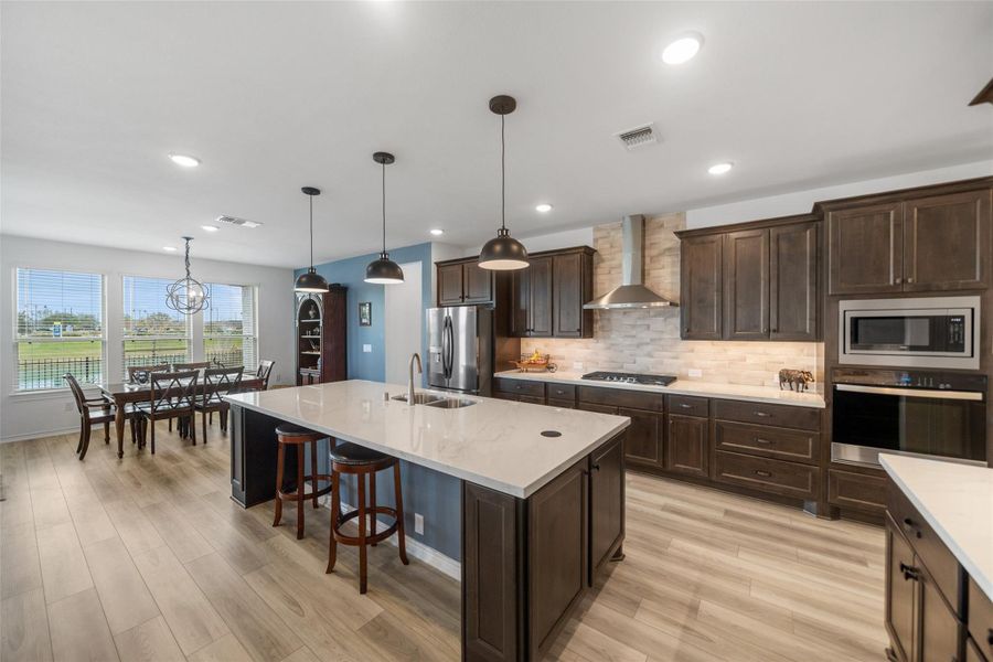 Counterspace galore, soft close drawers and cabinets and the flooring throughout is the popular white oak color vinyl plank.