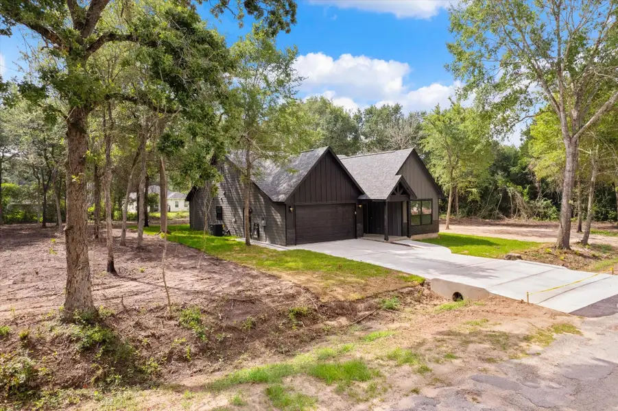 Front exterior of a new home in , Hempstead, TX, highlighting curb appeal (Image 2). Front exterior of a new home in , Hempstead, TX, highlighting curb appeal (Image 2).