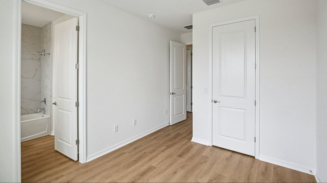 Furnished interior view inside a new home in Isla Mirada, San Antonio (Image 18).