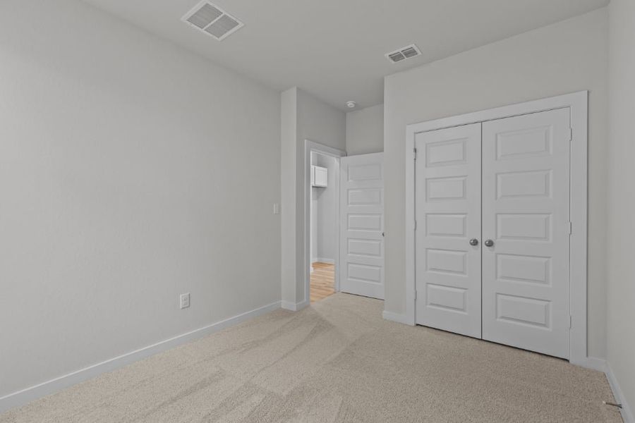 A room with white doors.