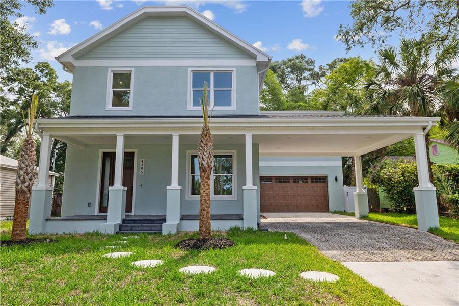 Front exterior of a new home in , Tampa, FL, highlighting curb appeal (Image 1). Front exterior of a new home in , Tampa, FL, highlighting curb appeal (Image 1).