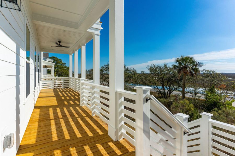 Exterior details and patio area of a home in Overlook at Copahee Sound, Awendaw (Image 45).