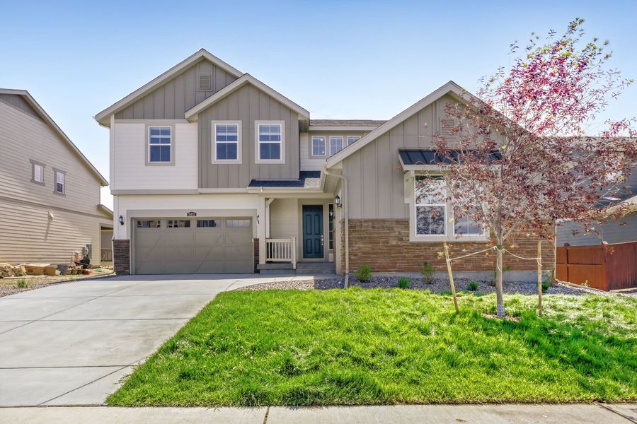 Front exterior of a new home in Willow Bend, Thornton, CO, highlighting curb appeal (Image 1). Front exterior of a new home in Willow Bend, Thornton, CO, highlighting curb appeal (Image 1).