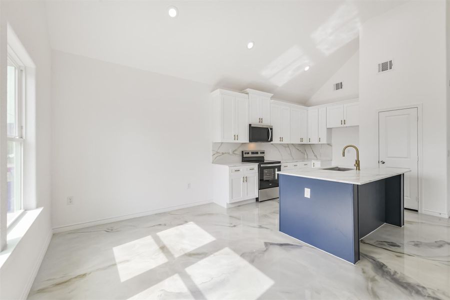 Furnished interior view inside a new home in Bridgeland, Cypress (Image 11).