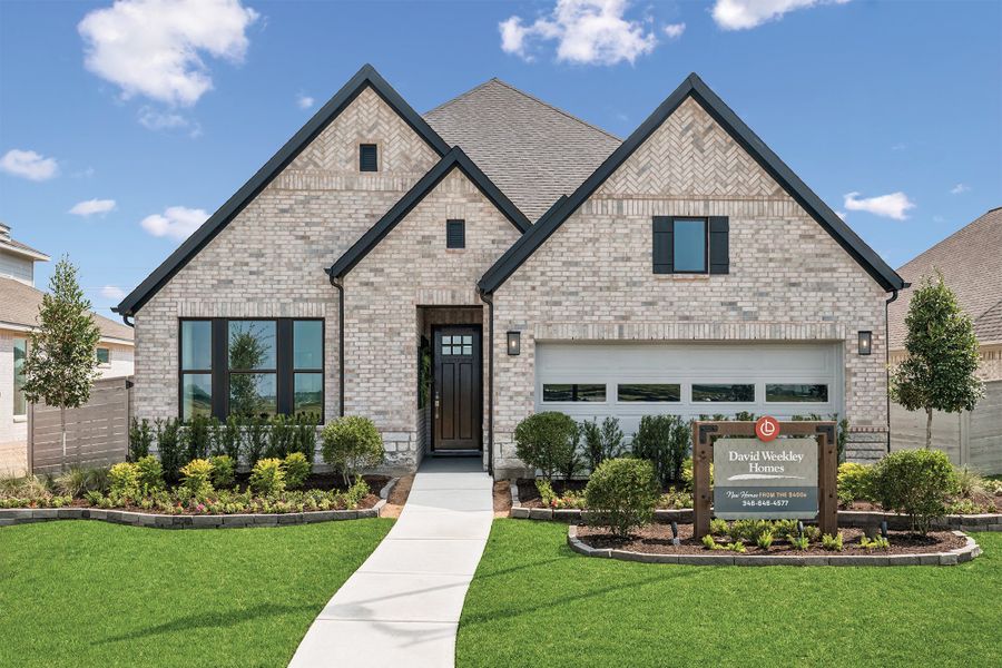 Representative exterior photo of a completed home built from the The Aspen by David Weekley Homes in Legacy, League City, TX (Image 1).