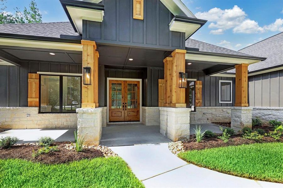 The front porch provides the perfect spot to relax and unwind, offering a peaceful place to sit and take in the sights and sounds of the neighborhood. Whether you're enjoying a morning coffee, reading a book, or simply watching the world go by, this inviting space makes for a serene retreat right at your doorstep.