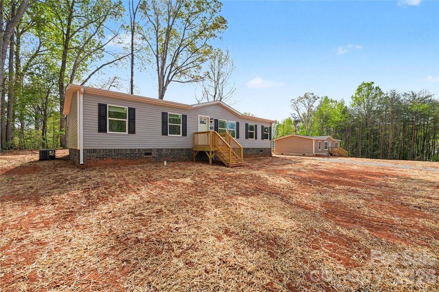 Exterior details and patio area of a home in , Statesville (Image 13).