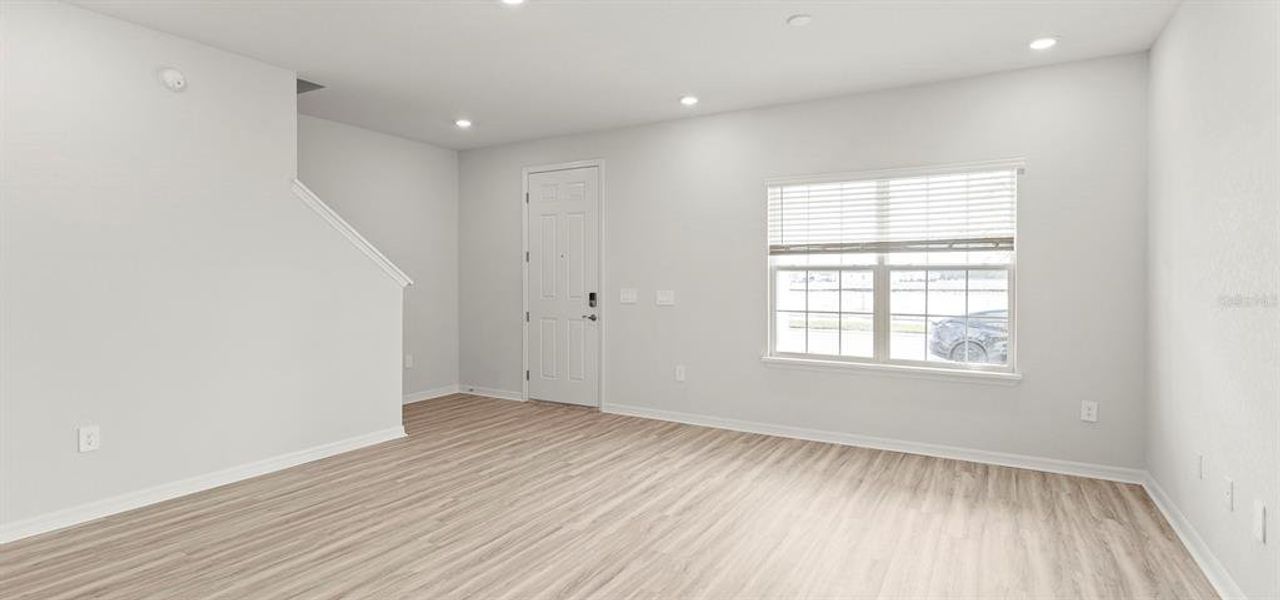 Spacious, unfurnished interior of a new home in Estates at Hickory Cove - Bungalows, St. Cloud (Image 15).
