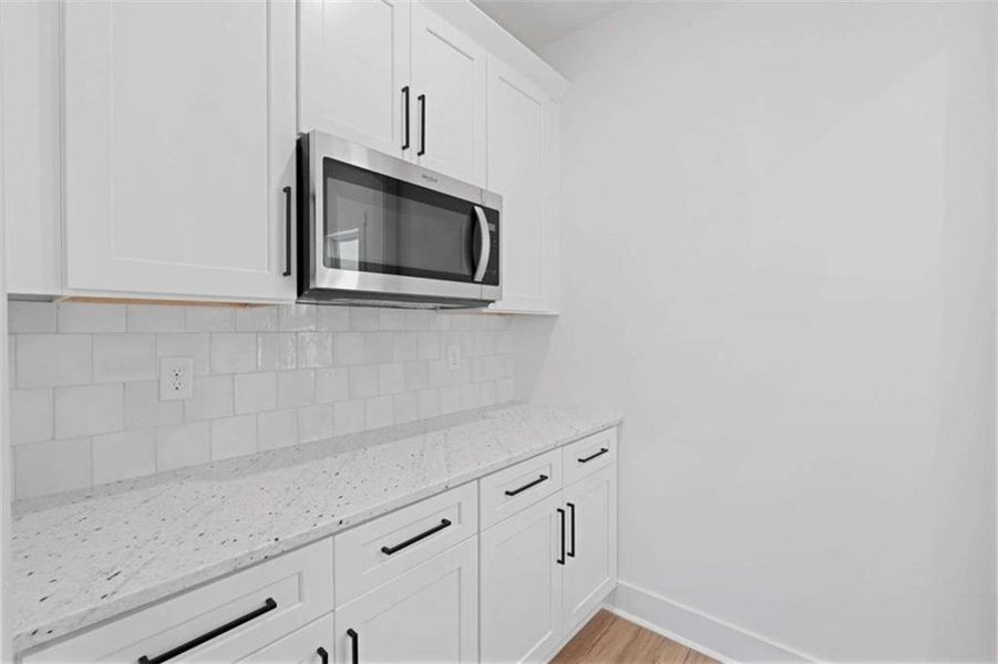 Furnished interior view inside a new home in , Covington (Image 9).
