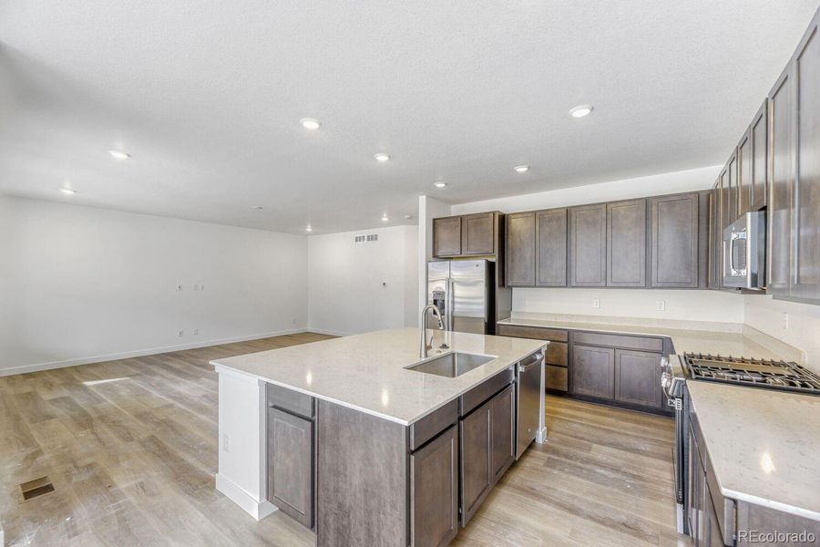 Furnished interior view inside a new home in Newlin Crossing, Parker (Image 3).