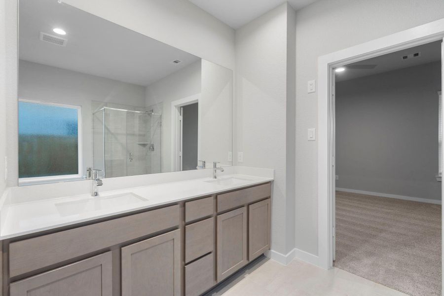 Furnished interior view inside a new home in Barton Creek Ranch, Conroe (Image 7).