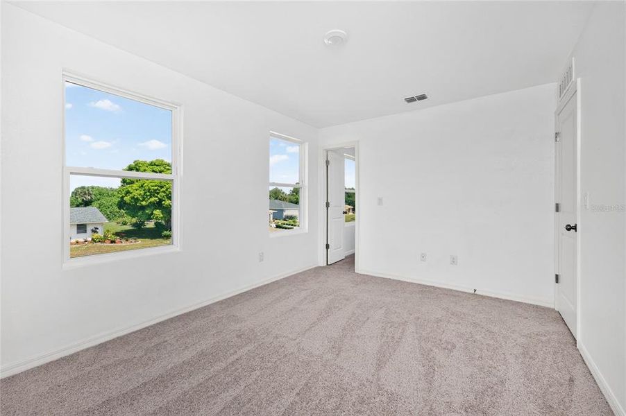 Spacious, unfurnished interior of a new home in , Port Charlotte (Image 36).
