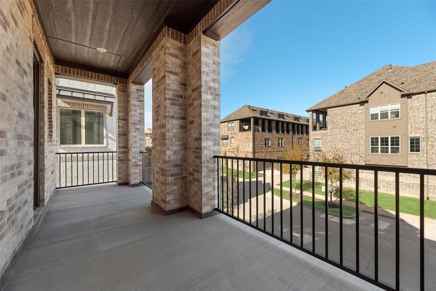 Exterior details and patio area of a home in Wade Settlement Townhomes, Frisco (Image 18).