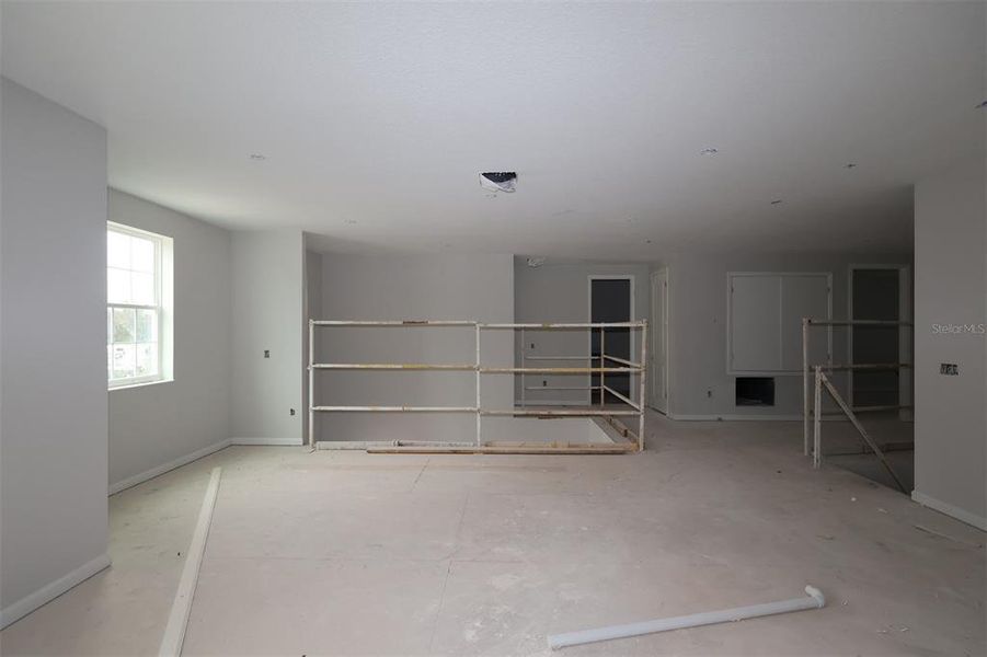 In-progress construction of a new home in Lake Star at Ovation, Winter Garden, FL (Image 12).