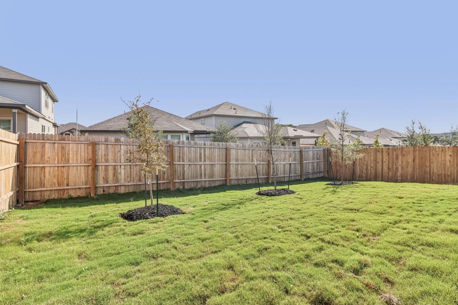 Back exterior of the Hughes floorplan at a Meritage Homes community.