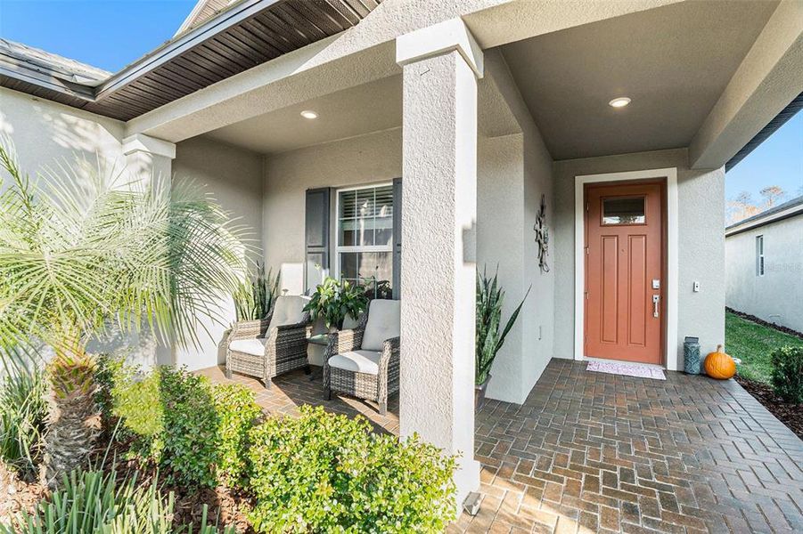 Exterior details and patio area of a home in Angeline Active Adult: Active Adult Manors, Land O' Lakes (Image 3).