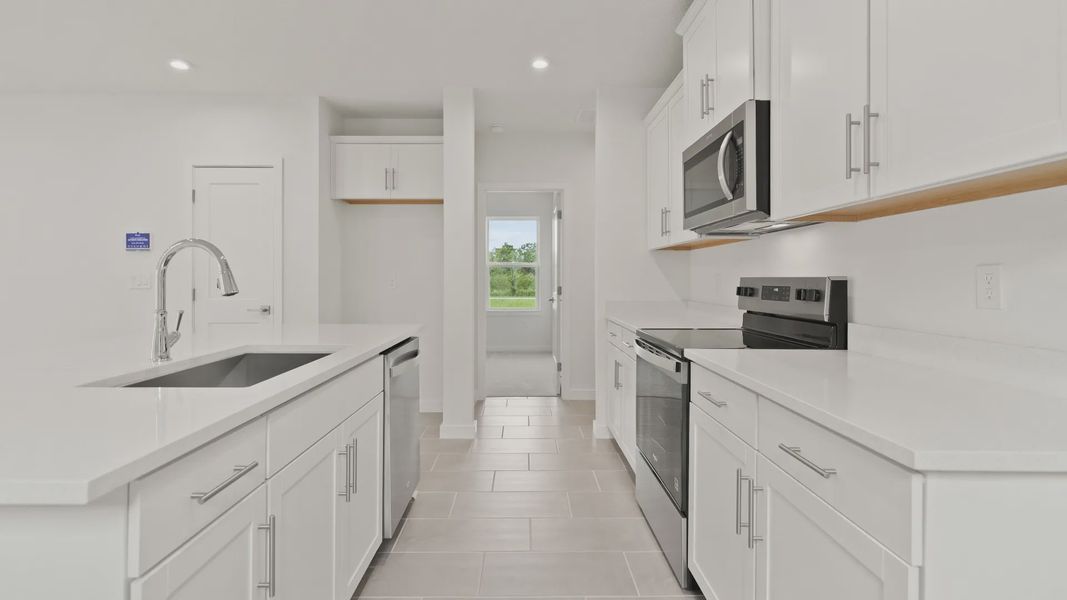 Furnished interior view inside a new home in Grasslands West, Lakeland (Image 7).