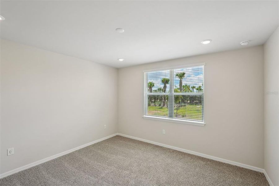 Spacious, unfurnished interior of a new home in Crescent Lakes - Premier Series, Punta Gorda (Image 23).