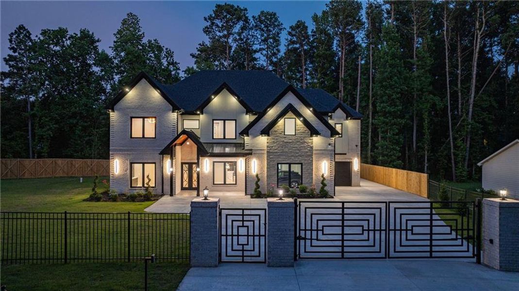 Front exterior of a new home in , Lawrenceville, GA, highlighting curb appeal (Image 39). Front exterior of a new home in , Lawrenceville, GA, highlighting curb appeal (Image 39).