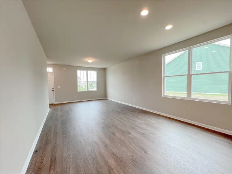 Unfurnished room featuring light wood-style flooring and recessed lighting