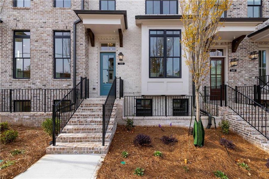 Exterior details and patio area of a home in Townes 333, Peachtree Corners (Image 24).