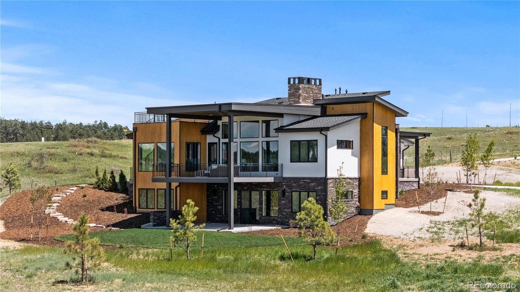 Front exterior of a new home in , Franktown, CO, highlighting curb appeal (Image 19).