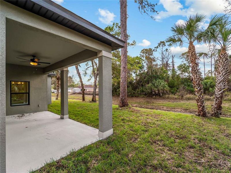Exterior details and patio area of a home in , North Port (Image 33).