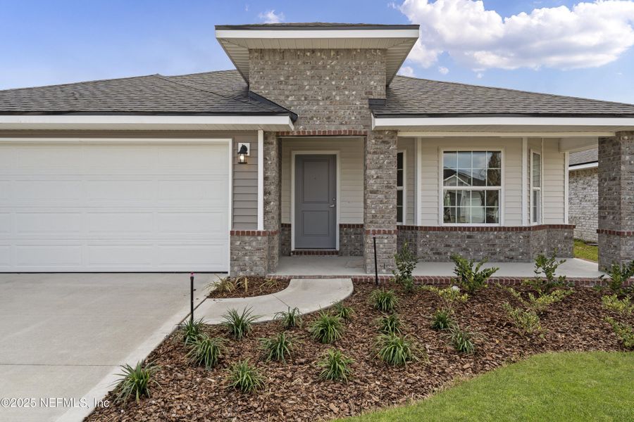 Front exterior of a new home in , Green Cove Springs, FL, highlighting curb appeal (Image 15). Front exterior of a new home in , Green Cove Springs, FL, highlighting curb appeal (Image 15).