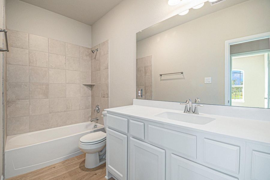 Furnished interior view inside a new home in Clear View Estates, Willis (Image 7).