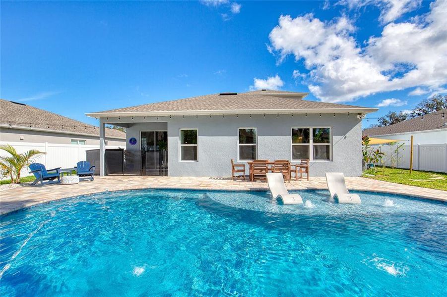 Exterior details and patio area of a home in , New Smyrna Beach (Image 24).