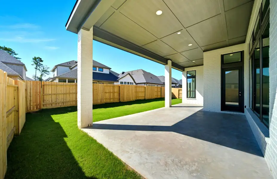 Exterior details and patio area of a home in Audubon 60', Magnolia (Image 1).