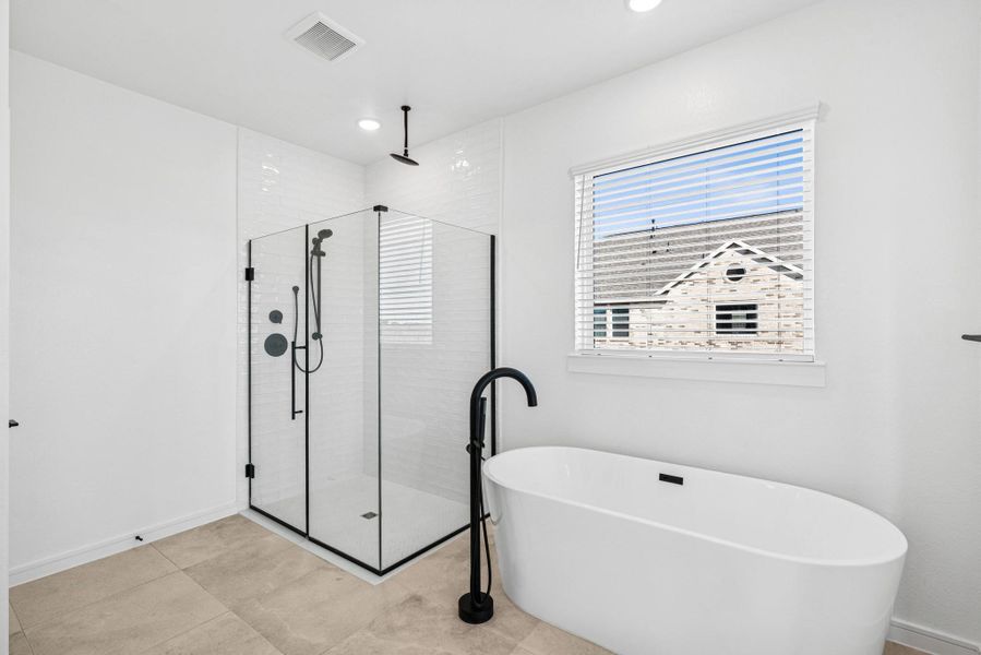 Luxurious primary bath (*Photo not of actual home and used for illustration purposes only.)