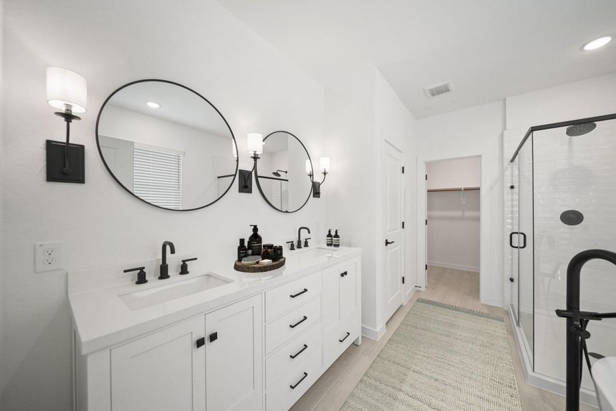 Luxurious primary bath (*Photo not of actual home and used for illustration purposes only.)