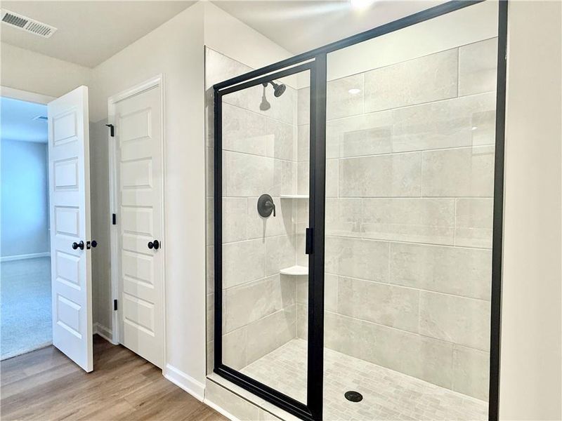 Furnished interior view inside a new home in Vines at Mill Creek - Estate Series, Braselton (Image 14). Furnished interior view inside a new home in Vines at Mill Creek - Estate Series, Braselton (Image 14).