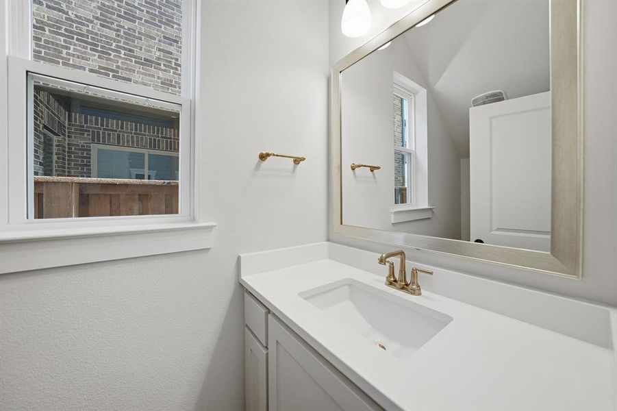 Bathroom featuring vanity