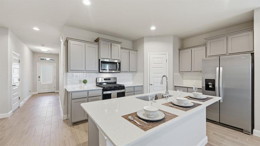 Kitchen - All Home and community information, including pricing, included features, terms, availability and amenities, are subject to change at any time without notice or obligation. All Drawings, pictures, photographs, video, square footages, floor plans, elevations, features, colors and sizes are approximate for illustration purposes only and will vary from the homes as built. Kitchen - All Home and community information, including pricing, included features, terms, availability and amenities, are subject to change at any time without notice or obligation. All Drawings, pictures, photographs, video, square footages, floor plans, elevations, features, colors and sizes are approximate for illustration purposes only and will vary from the homes as built.