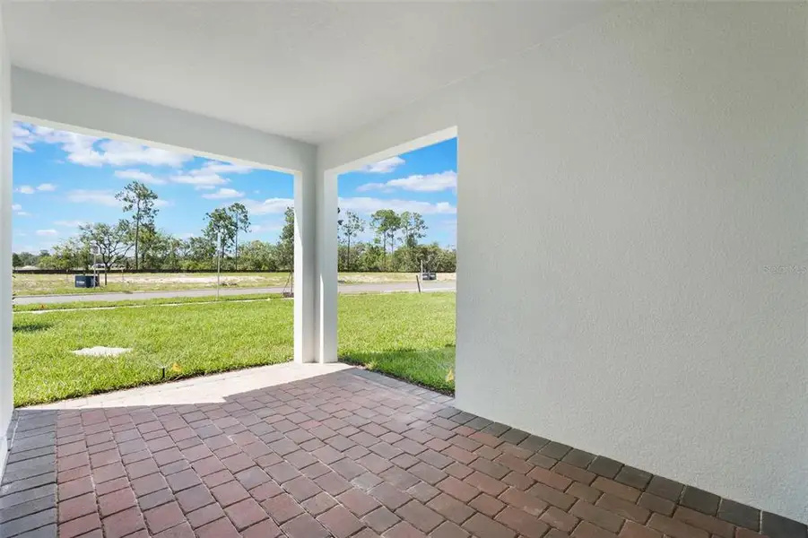 Exterior details and patio area of a home in Waterleigh, Winter Garden (Image 3).