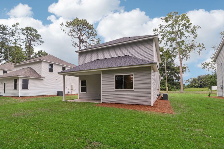 Exterior details and patio area of a home in Founder's Park, Lincolnville (Image 3).