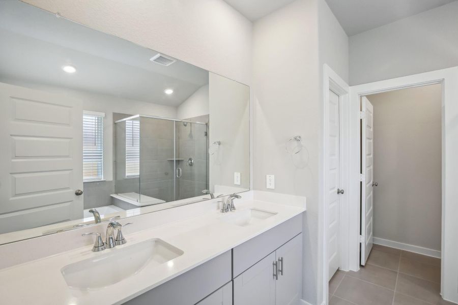 Furnished interior view inside a new home in Massey Oaks - Premier Series, Pearland (Image 10). Furnished interior view inside a new home in Massey Oaks - Premier Series, Pearland (Image 10).