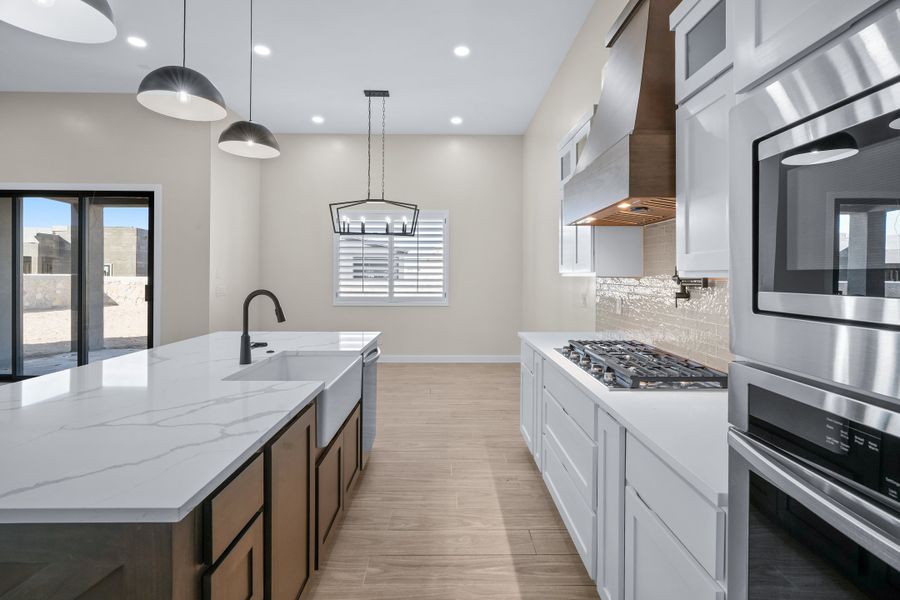 Representative furnished interior of a home built from the Pebble Beach EXT50 by LEH. Homes in Verdancia, El Paso (Image 8).