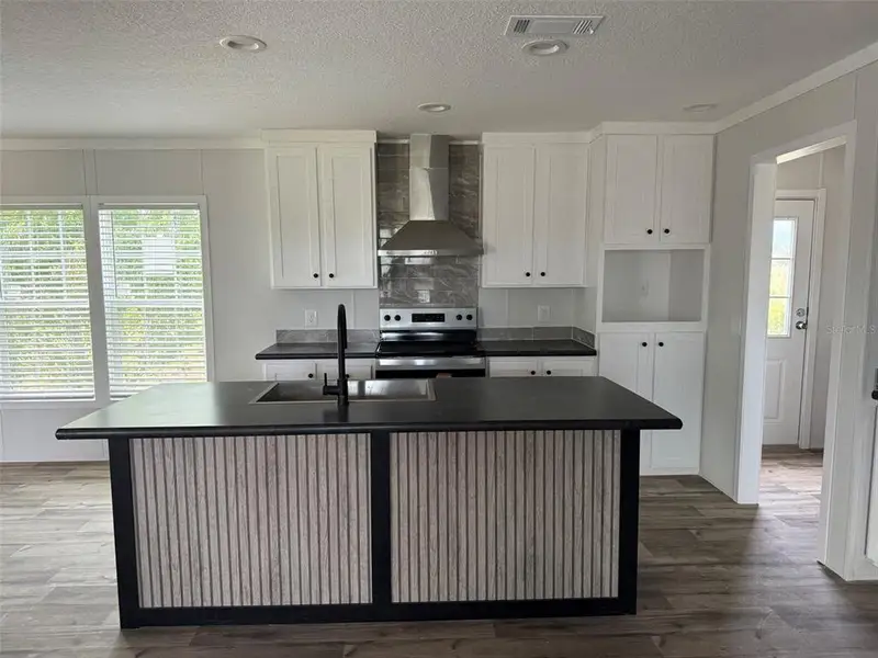 Furnished interior view inside a new home in , Okeechobee (Image 4). Furnished interior view inside a new home in , Okeechobee (Image 4).