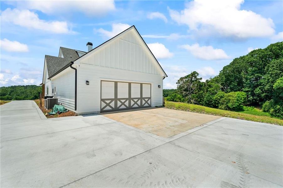 Front exterior of a new home in , Cumming, GA, highlighting curb appeal (Image 2).