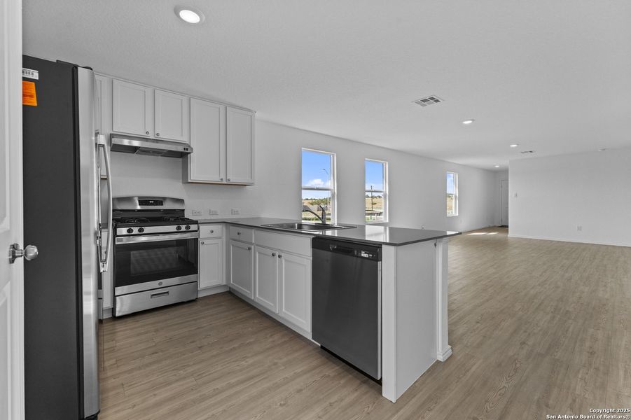 Furnished interior view inside a new home in , New Braunfels (Image 9).