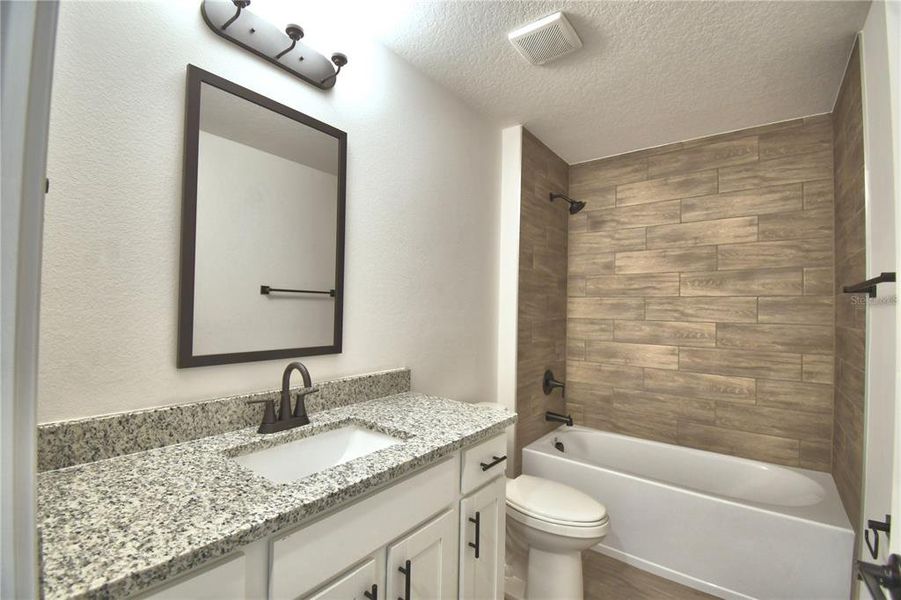 Furnished interior view inside a new home in Lake Juliana Estates, Auburndale (Image 14).