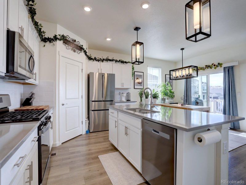 Furnished interior view inside a new home in Crystal Valley Pine Ridge, Castle Rock (Image 18).