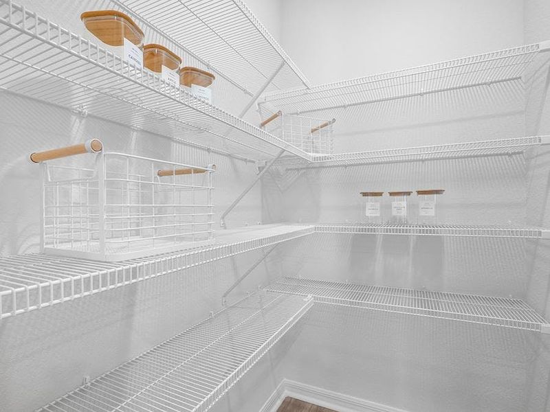 A walk-in pantry provides storage convenience - Raychel by Highland Homes A walk-in pantry provides storage convenience - Raychel by Highland Homes
