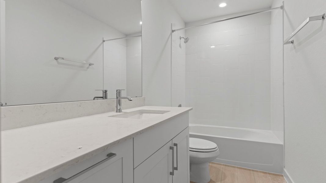 Furnished interior view inside a new home in Lexington Village, Missouri City (Image 12).