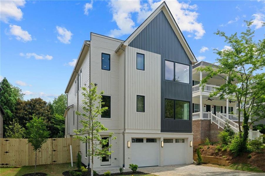 Front exterior of a new home in , Brookhaven, GA, highlighting curb appeal (Image 1). Front exterior of a new home in , Brookhaven, GA, highlighting curb appeal (Image 1).