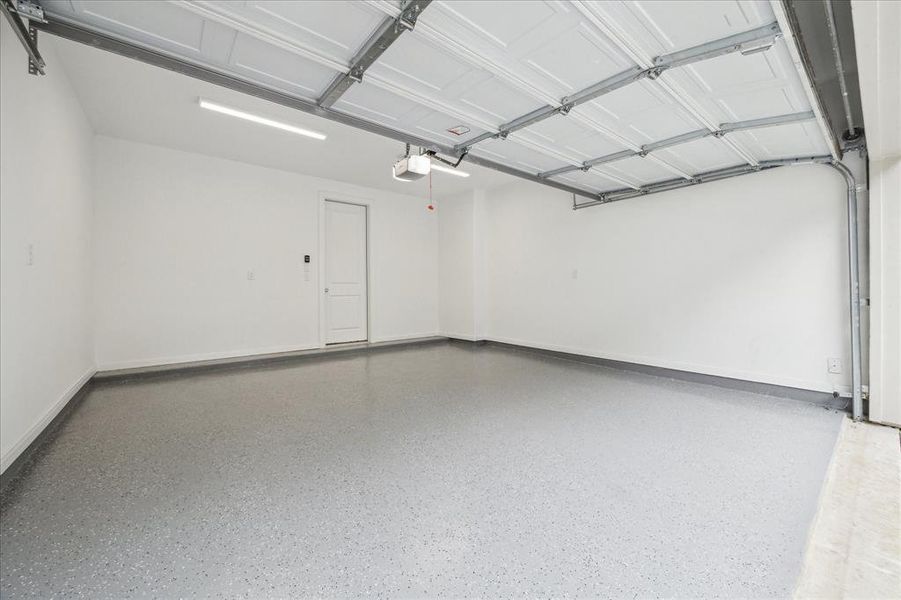 A view of the large 2 car garage withEpoxy garage floor.