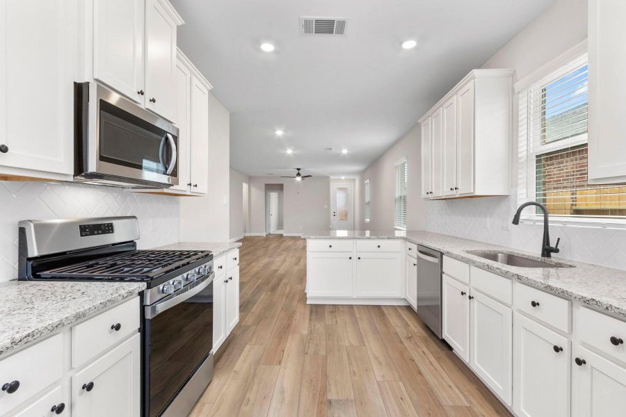 Furnished interior view inside a new home in Emberly, Beasley (Image 6).